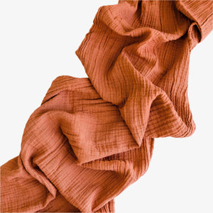 Burnt Sienna organic cotton runner in warm rust with crinkled texture, 156 inches long