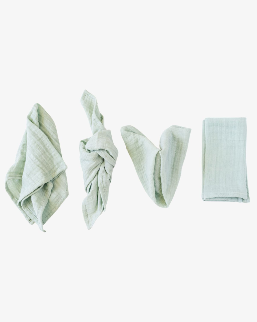 Sage organic cotton napkins in minty light green with crinkled texture, set of 4