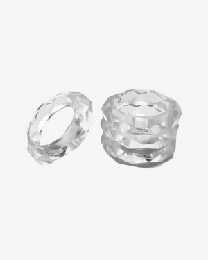 A set of clear, geometric napkin rings from the Prism Collection.
